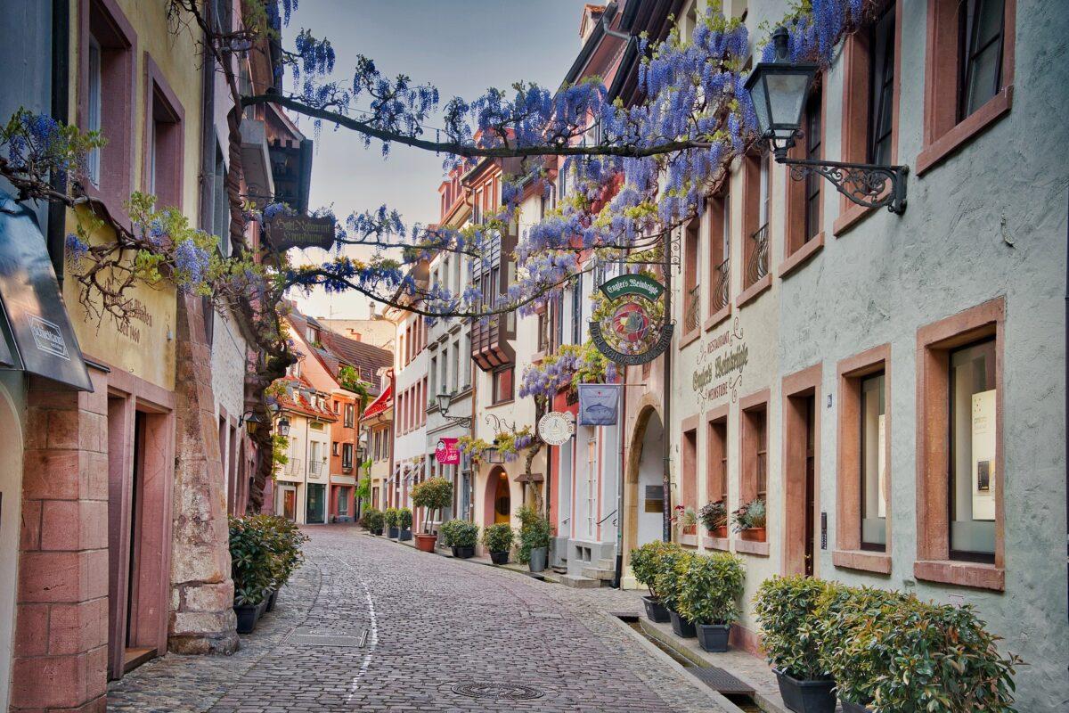 Freiburg's old town decorated with flower garlands. Sustainable travel in Germany